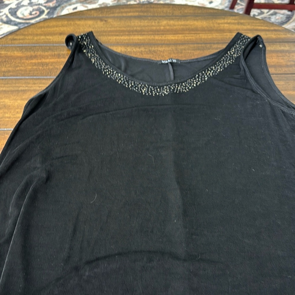 Vikki vi sleeves less shell